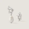 Asymmetrische oorbellen met kristallen en parels Asymmetrische oorbellen met kristallen en parels