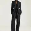 Broek met dubbele plooien van wol en mohair Broek met dubbele plooien van wol en mohair