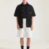 Cargo-bermuda in visgraatdenim Cargo-bermuda in visgraatdenim