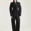 Cocoonbroek van wol met binnenstebuiten gedraaide details