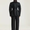 Cocoonbroek van wol met binnenstebuiten gedraaide details