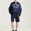 Couture-bomberjack in satijn met geborduurde Givenchy Paris-tekst Couture-bomberjack in satijn met geborduurde Givenchy Paris-tekst