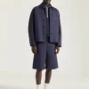 Couture-jasje met naden in denim, geborduurd met Givenchy Paris Couture-jasje met naden in denim, geborduurd met Givenchy Paris