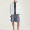 Couture-jasje met naden in denim, geborduurd met Givenchy Paris Couture-jasje met naden in denim, geborduurd met Givenchy Paris
