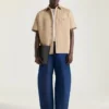 Couture-naad Indigoblauwe jeans met Givenchy-stempelprint Couture-naad Indigoblauwe jeans met Givenchy-stempelprint