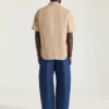 Couture-naad Indigoblauwe jeans met Givenchy-stempelprint Couture-naad Indigoblauwe jeans met Givenchy-stempelprint