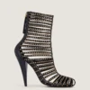 Enkellaarsjes met kooiontwerp van leer met studs