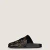 Label platte muiltjes van leer met studs Label platte muiltjes van leer met studs