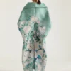 Lange jas met splitten in jacquard met rozenmotief Lange jas met splitten in jacquard met rozenmotief