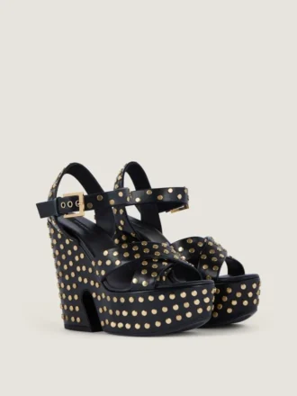 Lederen platformclogs met studs Lederen platformclogs met studs