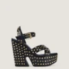 Lederen platformclogs met studs Lederen platformclogs met studs