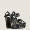 Lederen platformclogs met studs Lederen platformclogs met studs