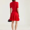 Mini-polojurk van gebreide stof met second-skin-effect Mini-polojurk van gebreide stof met second-skin-effect