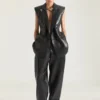 Broek met dubbele plooien van leer Broek met dubbele plooien van leer