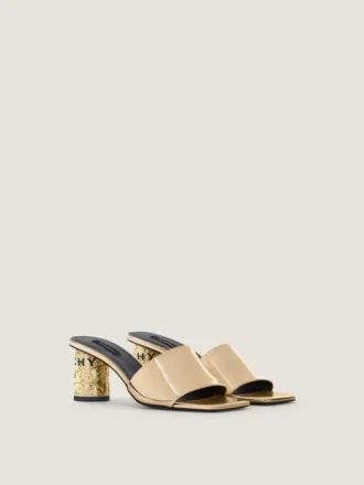 Mules met hak en tape-effect in leer met spiegeleffect