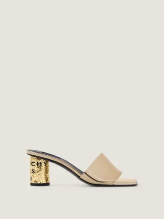 Mules met hak en tape-effect in leer met spiegeleffect