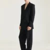 Op maat gemaakte broek met dubbele plooi van wollen twill Op maat gemaakte broek met dubbele plooi van wollen twill