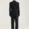 Op maat gemaakte broek met dubbele plooi van wollen twill Op maat gemaakte broek met dubbele plooi van wollen twill