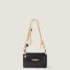 Pout-tasje van leer met Lucky Charms-ketting Pout-tasje van leer met Lucky Charms-ketting