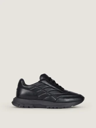 Sneakers van glanzend gewatteerd leer